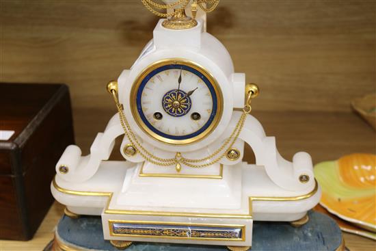 A 19th century French alabaster mantel timepiece, H.43cm.